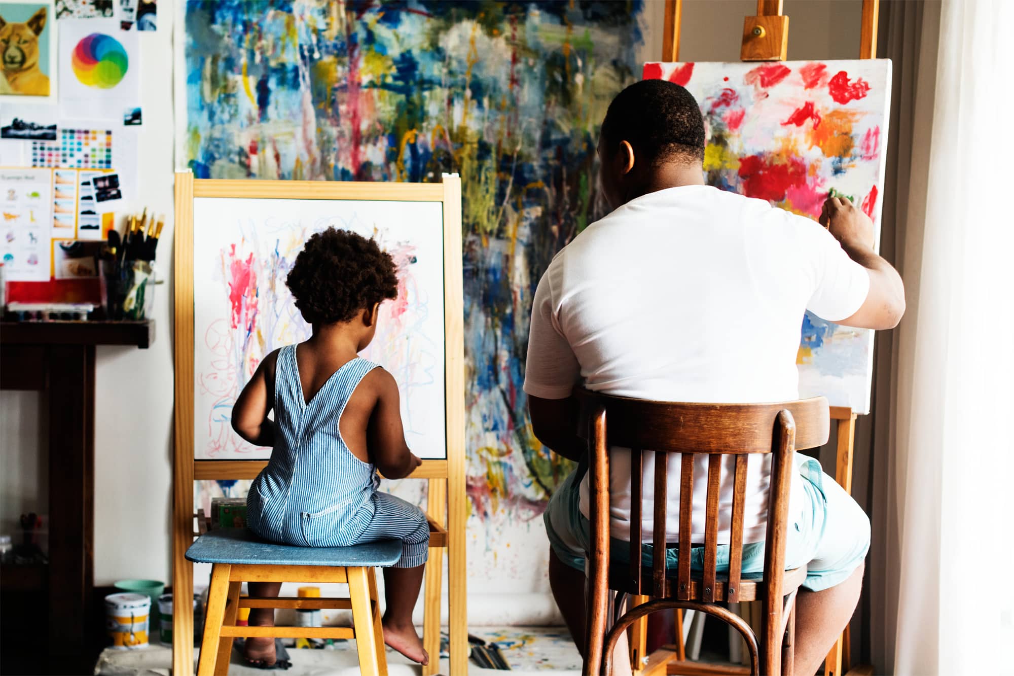 Man painting with Son